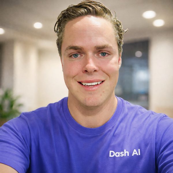 Jordan Langdon, founder of Dash AI, smiling in a purple Dash AI t-shirt
